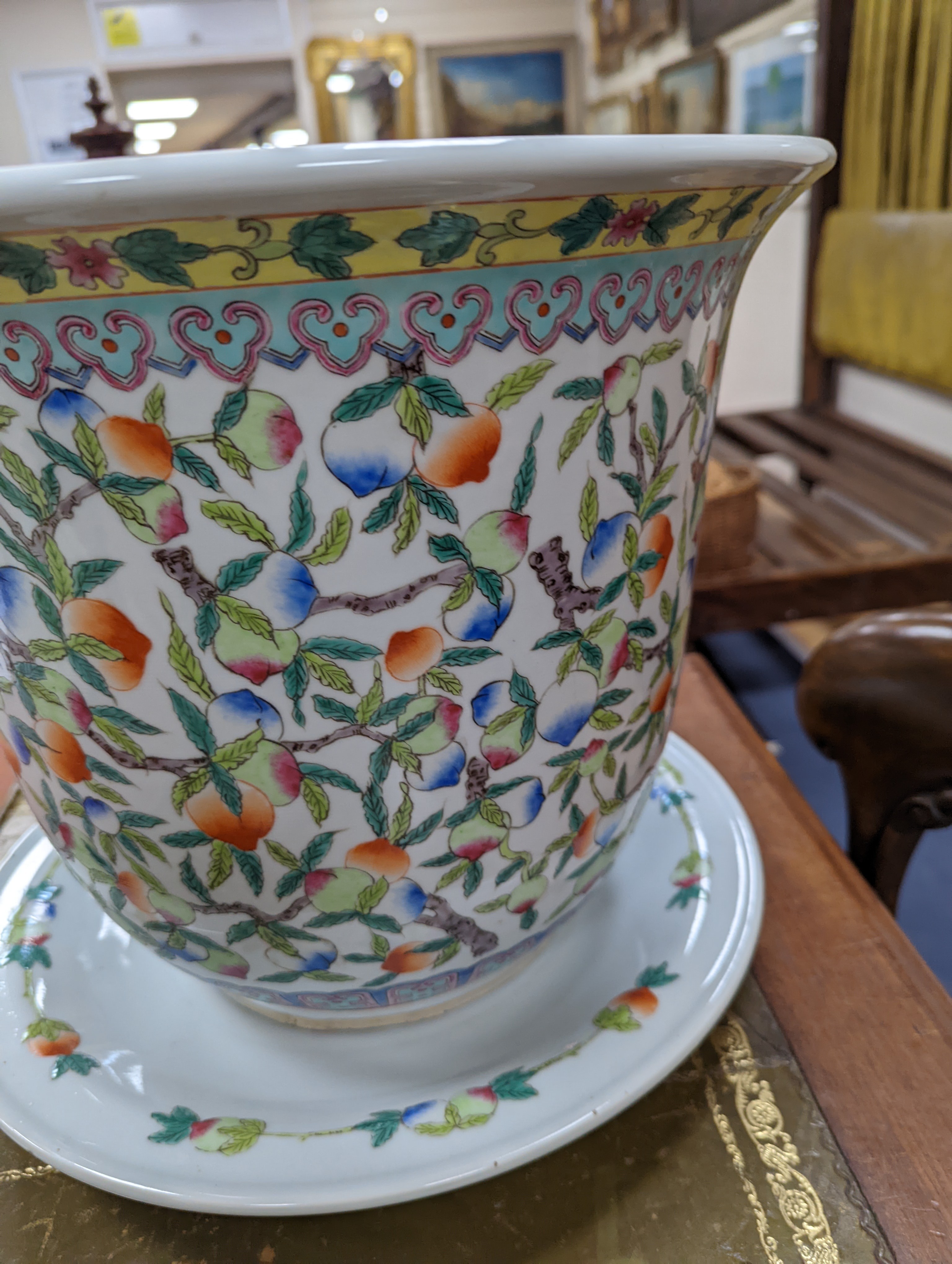 A 20th century Chinese porcelain jardiniere and dish, diameter 36 cms.